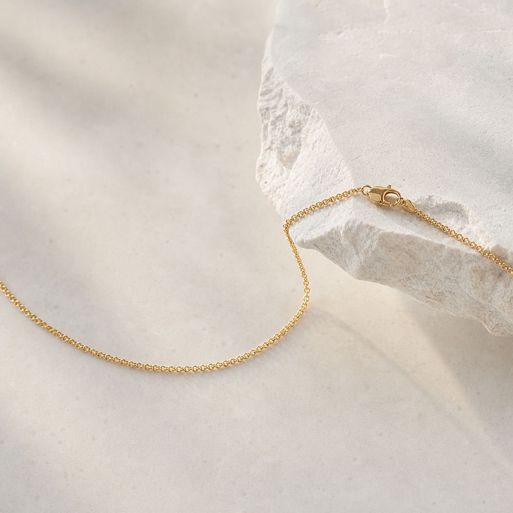 Fine chain work with a softened clasp.